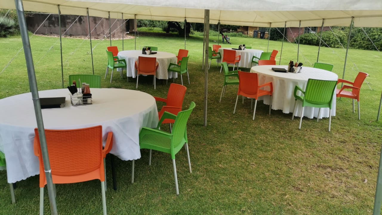 Garden tables beneath the marquee at Fore @ Kimiad
